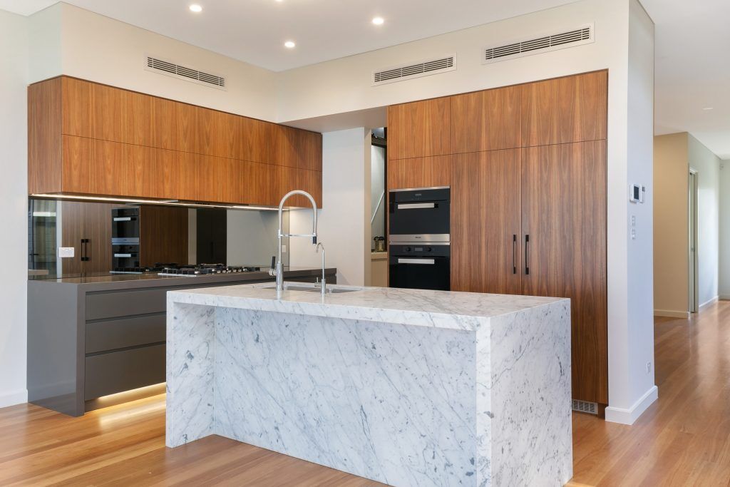 Annandale, Timber Veneer and polyurethane kitchen with a Carrara Marble feature island