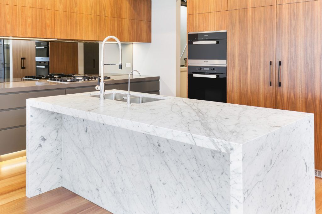 Annandale, Timber Veneer and polyurethane kitchen with a Carrara Marble feature island