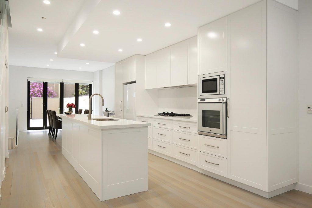 AFTER Lilyfield Renovation, Polyurethane Shaker Style kitchen with an island bench and Michelangelo stone tops