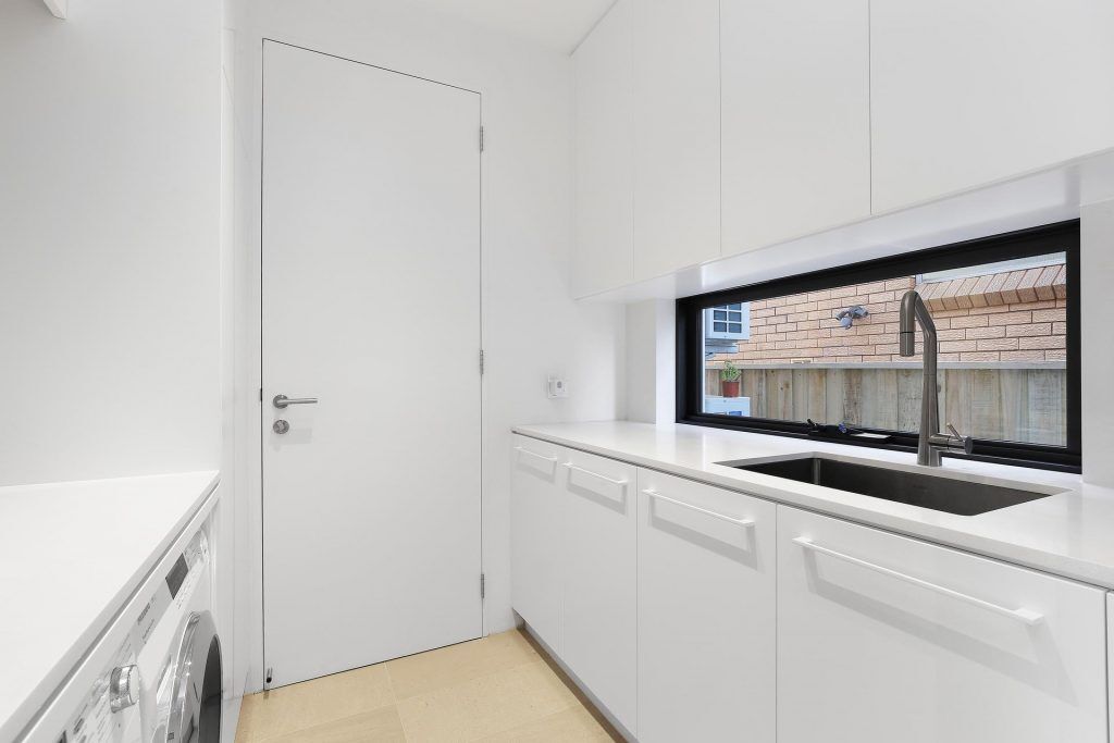 Polyurethane laundry with 20mm stone benchtops - Putney, Sydney