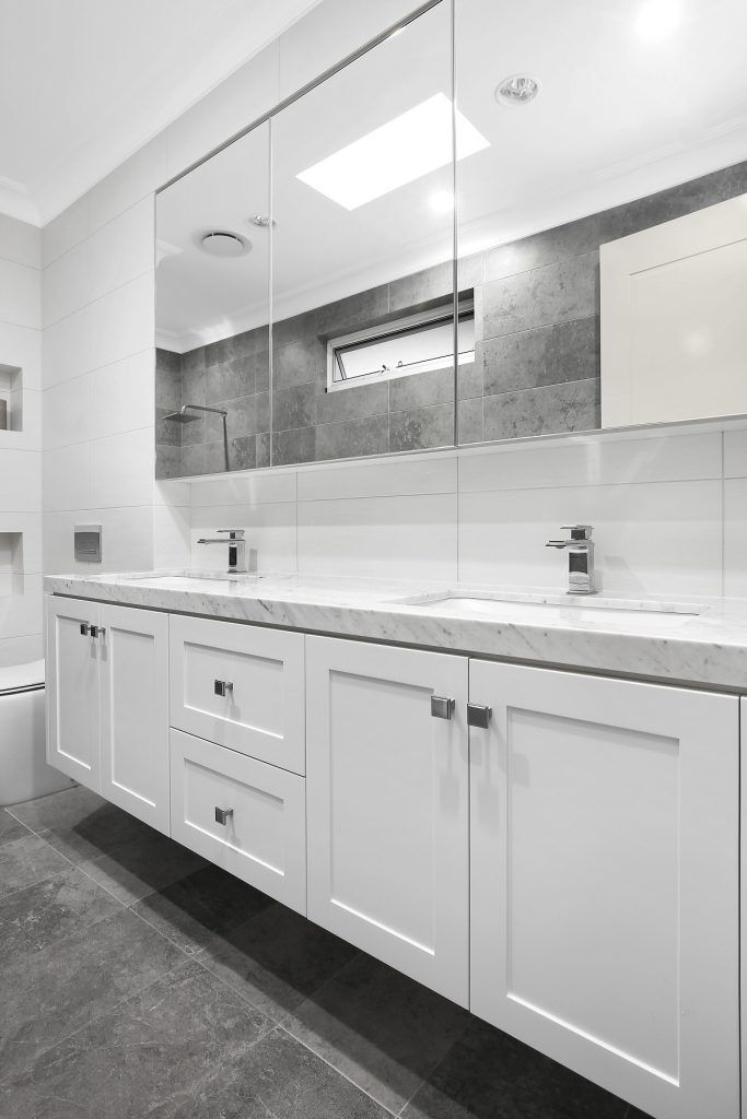 Shaker style vanity with a Caesarstone top and mirror cabinets above - Earlwood, Sydney