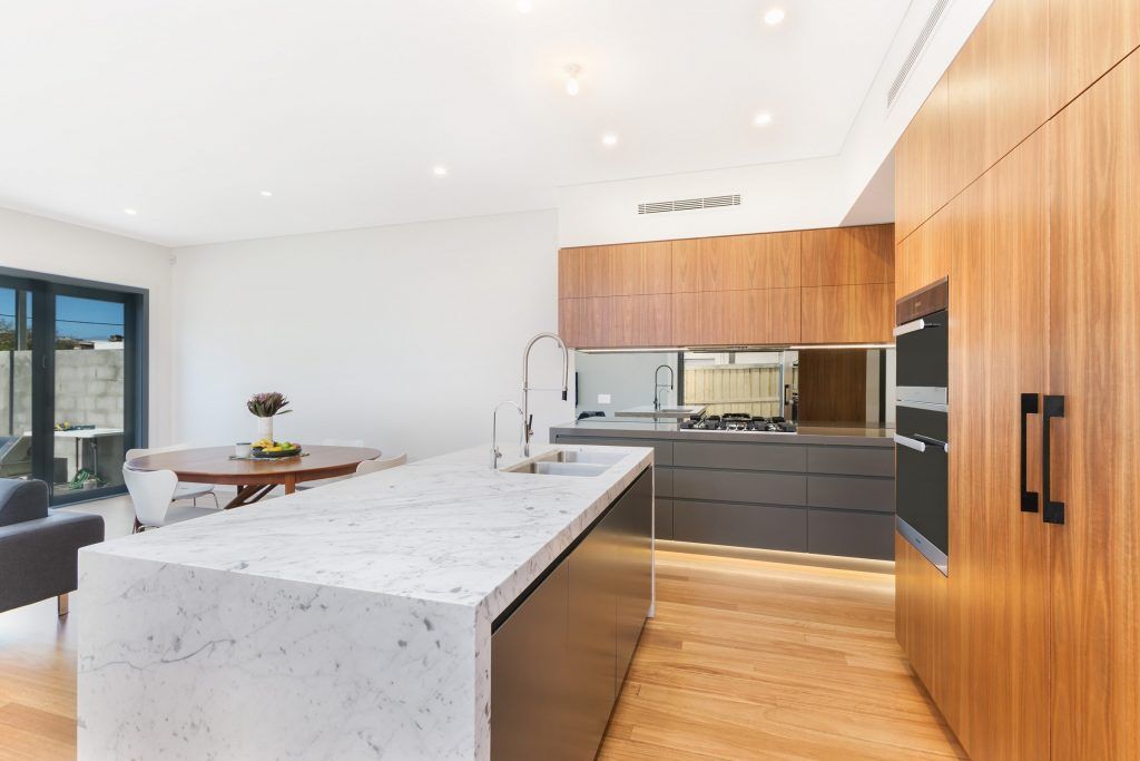 Annandale, Timber Veneer and polyurethane kitchen with a Carrara Marble feature island