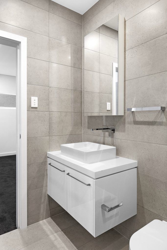 Satin Polyurethane vanity and Caesarstone top with mirror cabinets above - Chipping Norton, Sydney