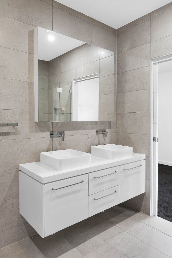 Satin Polyurethane vanity and Caesarstone top with mirror cabinets above - Chipping Norton, Sydney
