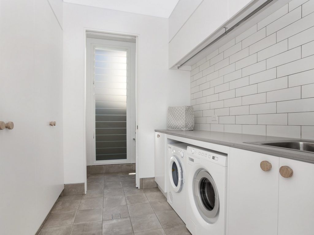 Polyurethane laundry with custom made timber handles - Northbridge, Sydney