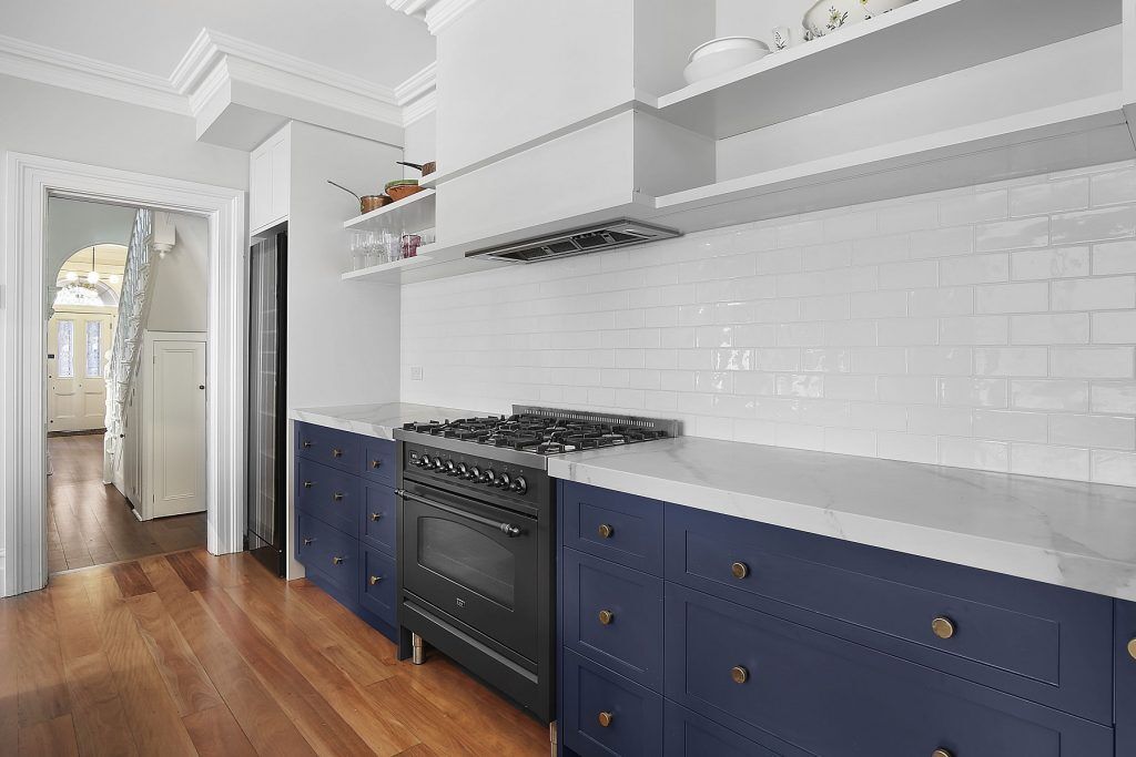 Stanmore, Shaker Style kitchen in Winter Terrace and Blue Rhapsody Polyurethane with a Smart Stone Borghini Naturale benchtop