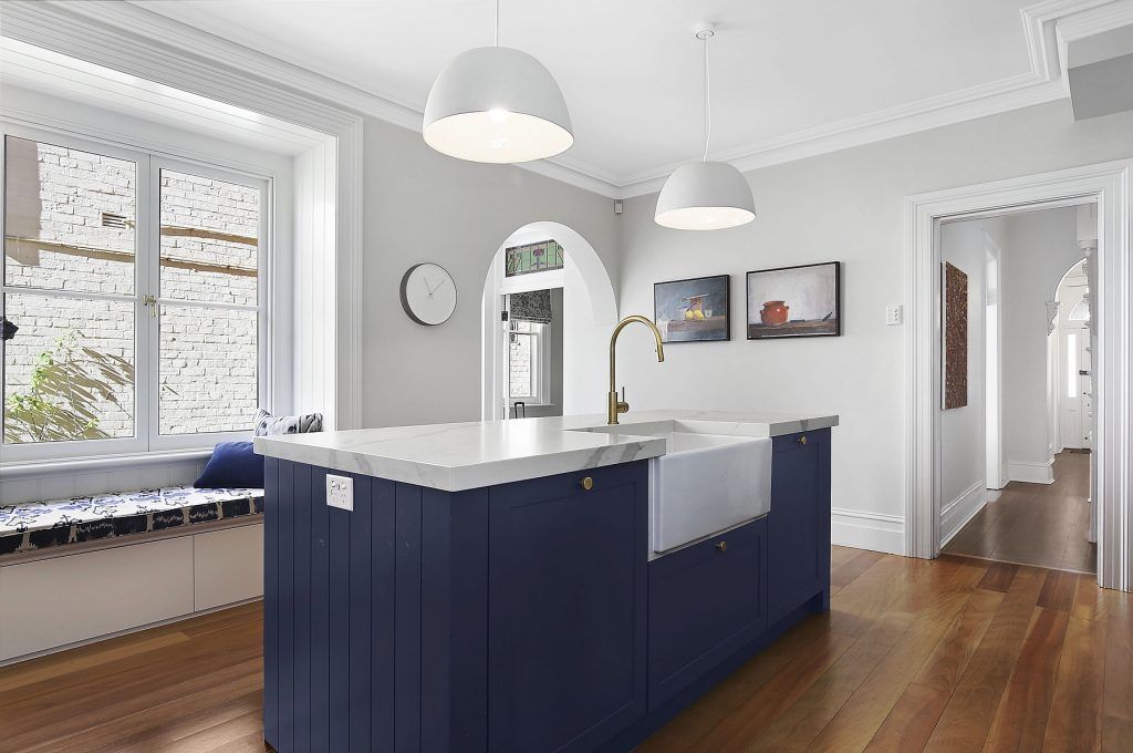 Stanmore, Shaker Style kitchen in Winter Terrace and Blue Rhapsody Polyurethane with a Smart Stone Borghini Naturale benchtop