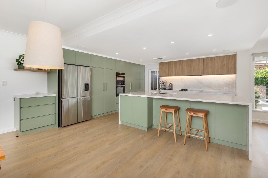 Castle Hill, Satin polyurethane streamline kitchen with a stone island, benchtop and splashback