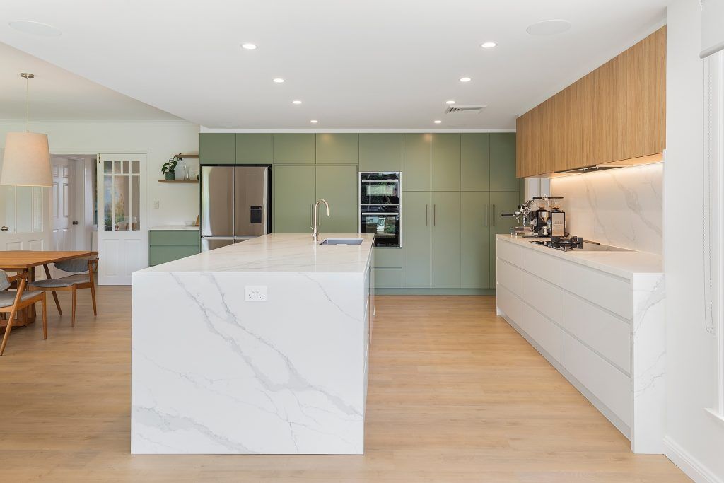 Castle Hill, Satin polyurethane streamline kitchen with a stone island, benchtop and splashback