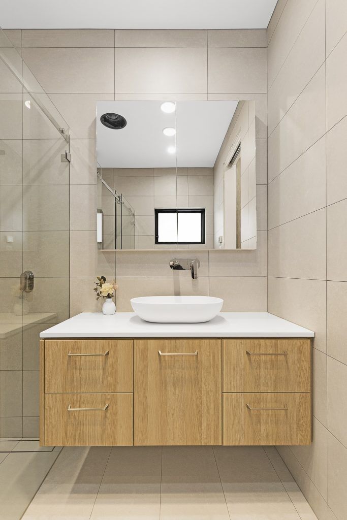 Natural Oak Ravine Laminate vanity with a 20mm stone benchtop - Chipping Norton, Sydney