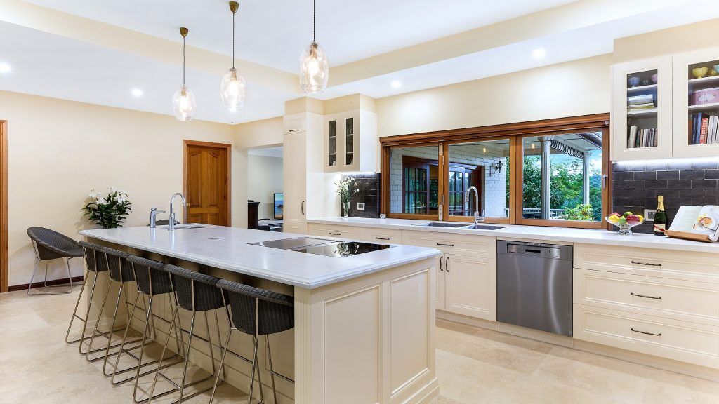 Epping, Provincial Style kitchen in a Satin Polyurethane finish with a Carrara Marble benchtop