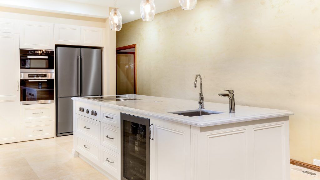 Epping, Provincial Style kitchen in a Satin Polyurethane finish with a Carrara Marble benchtop