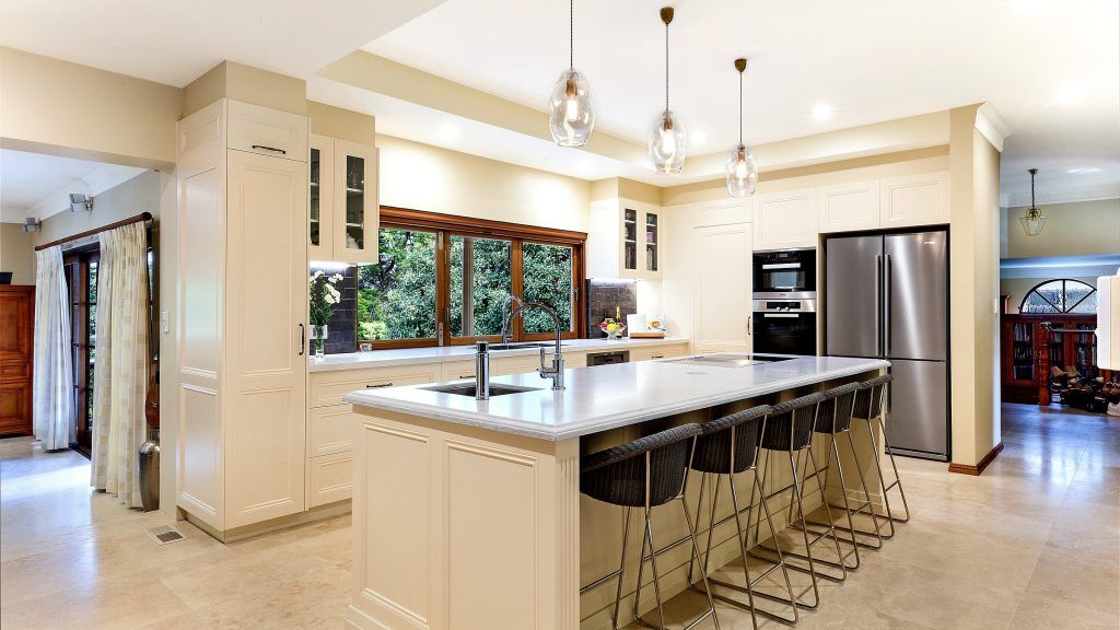 AFTER Epping Renovation - Provincial Style kitchen in a Satin Polyurethane finish with a Carrara Marble benchtop
