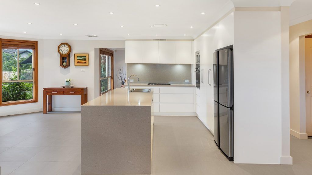 AFTER Menai Renovation, Satin Polyurethane kitchen with a Quantum Quartz benchtop