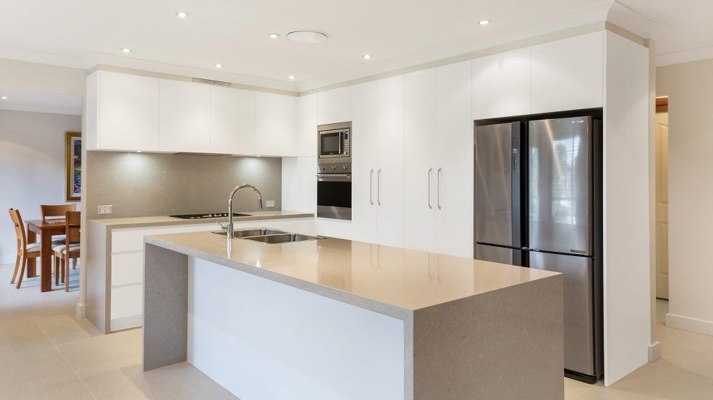 AFTER Menai Renovation, Satin Polyurethane kitchen with a Quantum Quartz benchtop