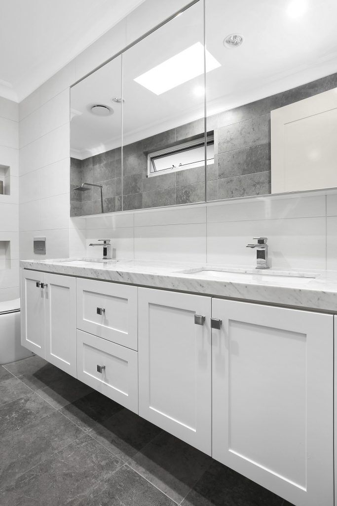 Shaker style vanity with a Caesarstone top and mirror cabinets above - Earlwood, Sydney