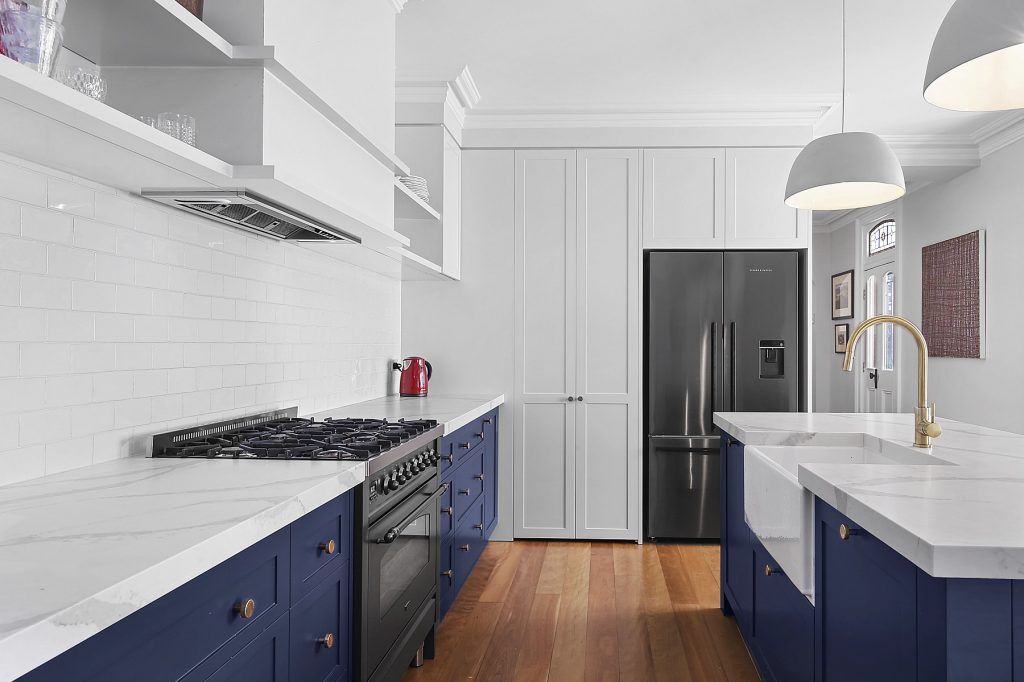 Stanmore, Shaker Style kitchen in Winter Terrace and Blue Rhapsody Polyurethane with a Smart Stone Borghini Naturale benchtop