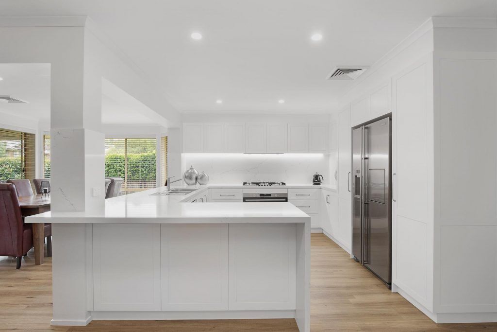 Castle Hill, Polyurethane Shaker style kitchen with stone benchtop and splashback