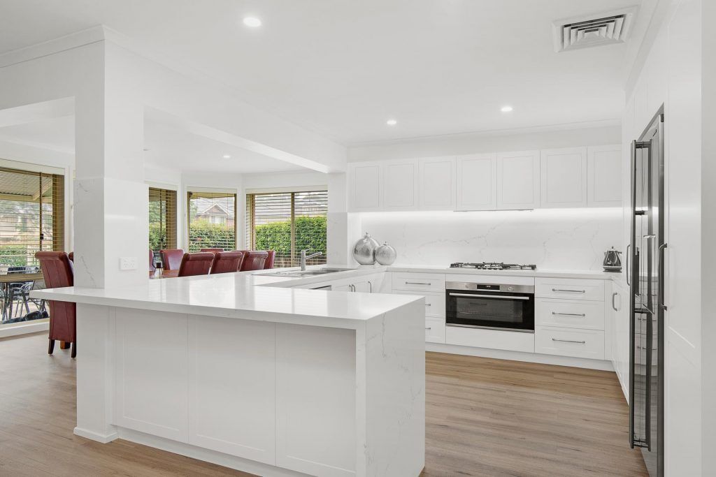 Castle Hill, Polyurethane Shaker style kitchen with stone benchtop and splashback