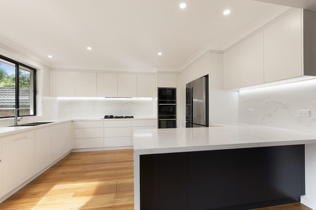 Forestville, Streamline polyurethane kitchen with integrated 45 degree handles