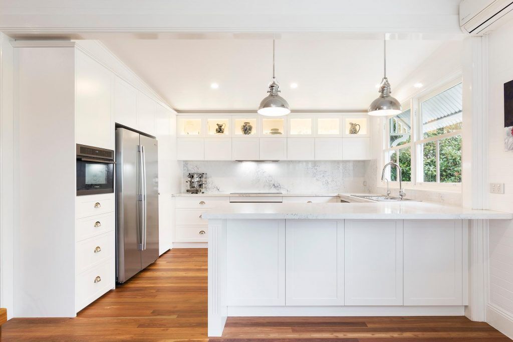 Point Claire, Satin Polyurethane Shaker style kitchen with a Monte Bianco Quantum Quartz benchtop and splashback