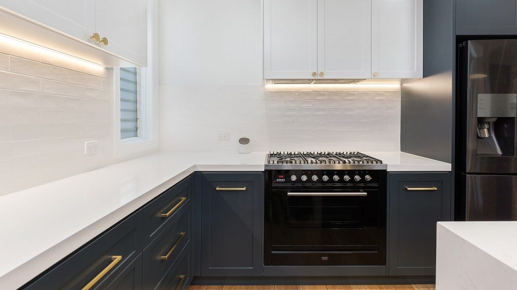 Annandale, Shaker style kitchen, Caesarstone bench with waterfall return, Blue Rhapsody door colour