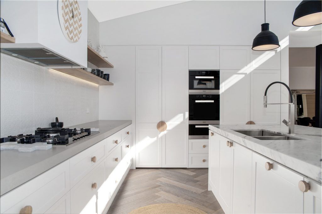 Northbridge Sydney, Satin Polyurethane Shaker Style kitchen with a Calacatta Marble Island Benchtop