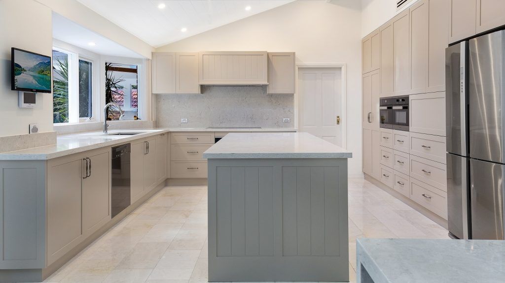 Wahroonga Sydney, Satin Polyurethane Shaker Style kitchen with V-Groove feature panels and a Caesarstone benchtop