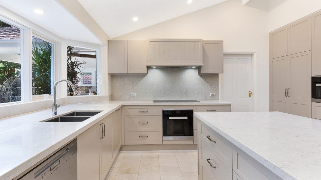 Wahroonga Sydney, Satin Polyurethane Shaker Style kitchen with V-Groove feature panels and a Caesarstone benchtop