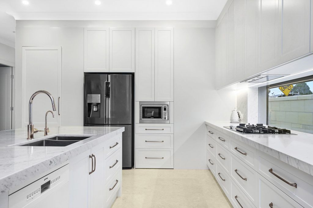 Earlwood, Shaker style two-tone Polyurethane kitchen with a Carrara marble benchtop