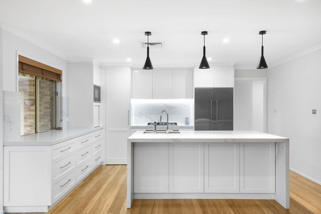 Wattle Grove, Satin Polyurethane Shaker Style kitchen, Statuario Maximus Caesarstone splashback and island bench with waterfall return