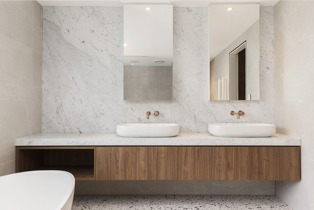 Polytec Woodmatt double vanity with a Carrara Marble top and splashback with mirror cabinets - Concord, Sydney