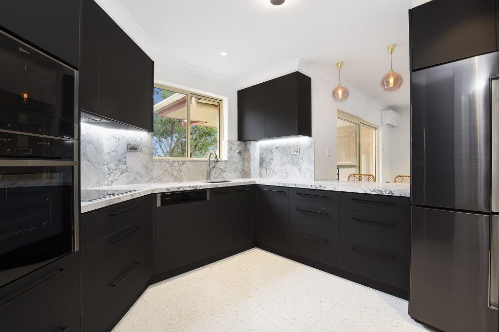 Miranda, Venette kitchen in Polytec Black with a 40mm Super White stone benchtop and splashback