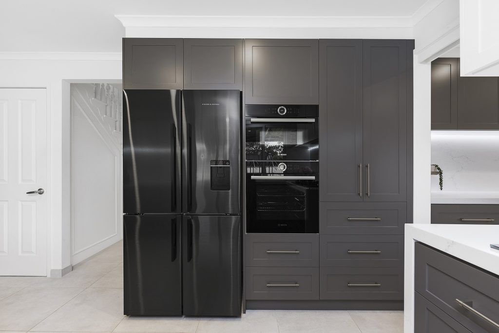 Chipping Norton, Shaker polyurethane kitchen with a Quantum Quartz Michelangelo benchtop, splashback and waterfall return breakfast bar