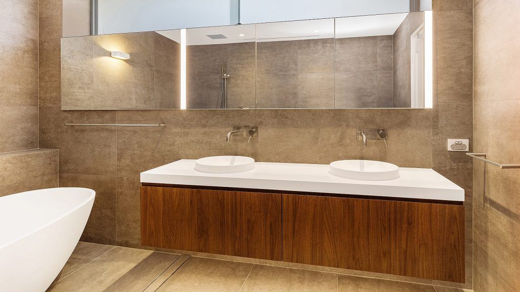 Likewood vanity with a Caesarstone top and mirror cabinets above - Dover Heights, Sydney
