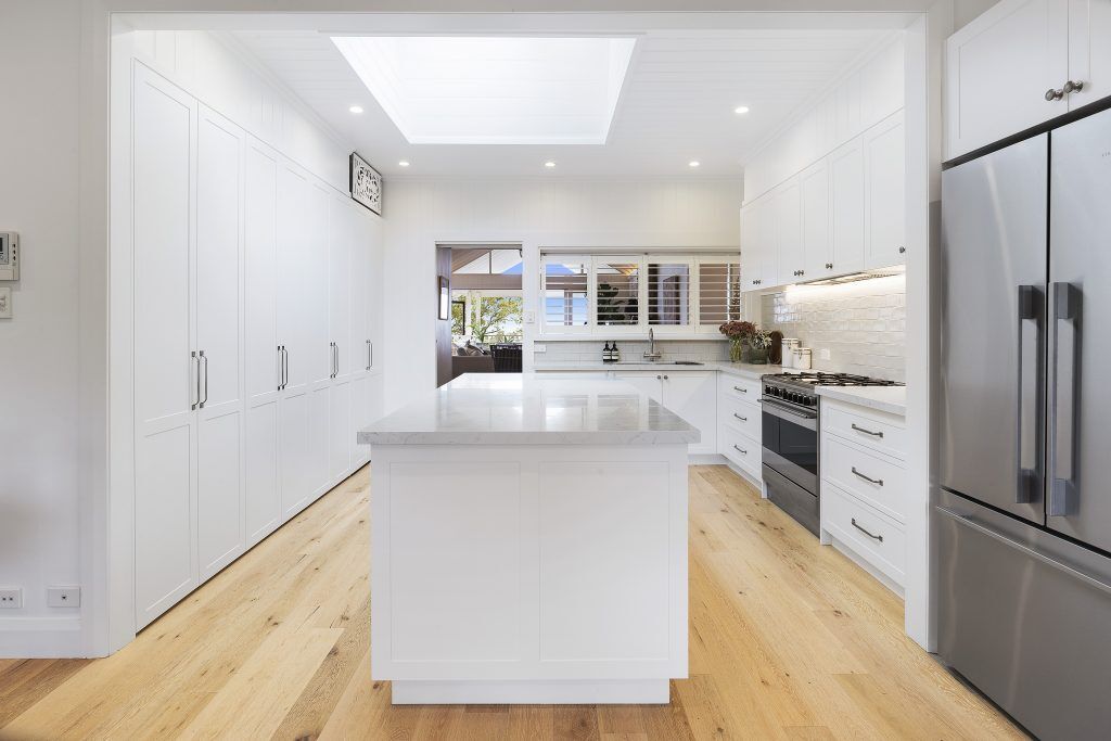 AFTER Narraweena Renovation - Polyurethane Shaker Style kitchen with a Quantum Quartz benchtop in Michelangelo