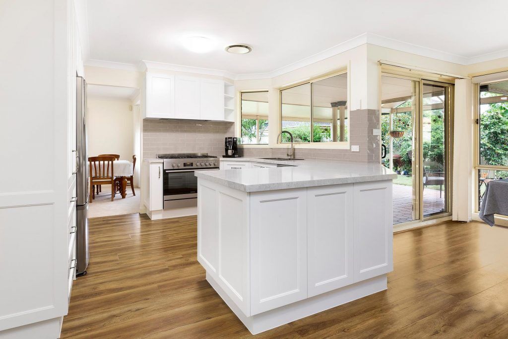Chipping Norton, Polyurethane Shaker style kitchen with a Caesarstone benchtop in Bianco Drift