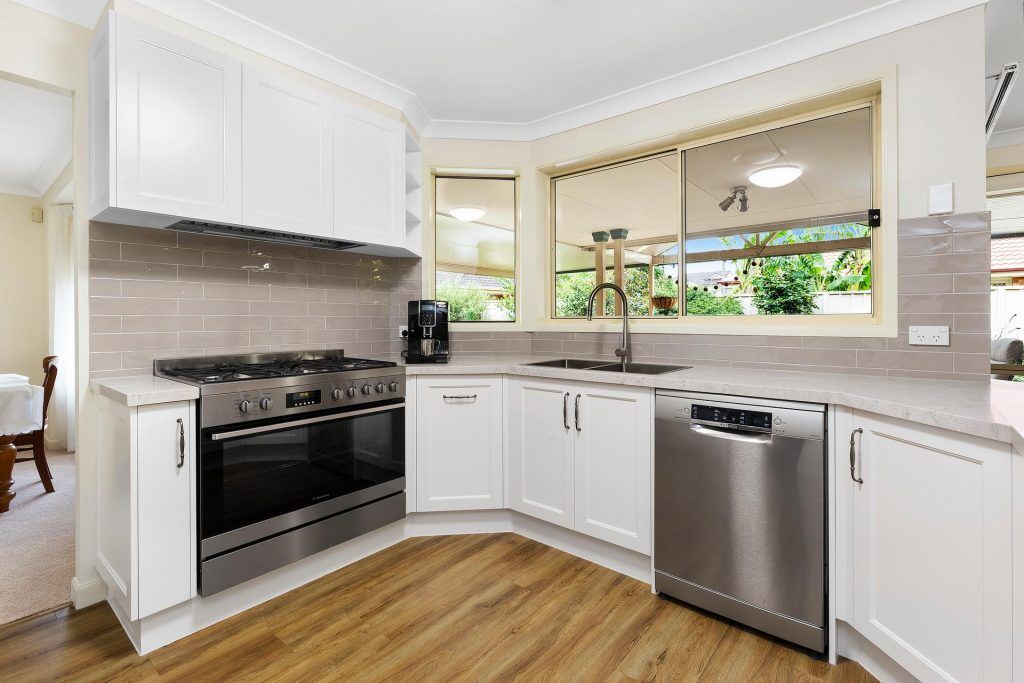 Chipping Norton, Polyurethane Shaker style kitchen with a Caesarstone benchtop in Bianco Drift