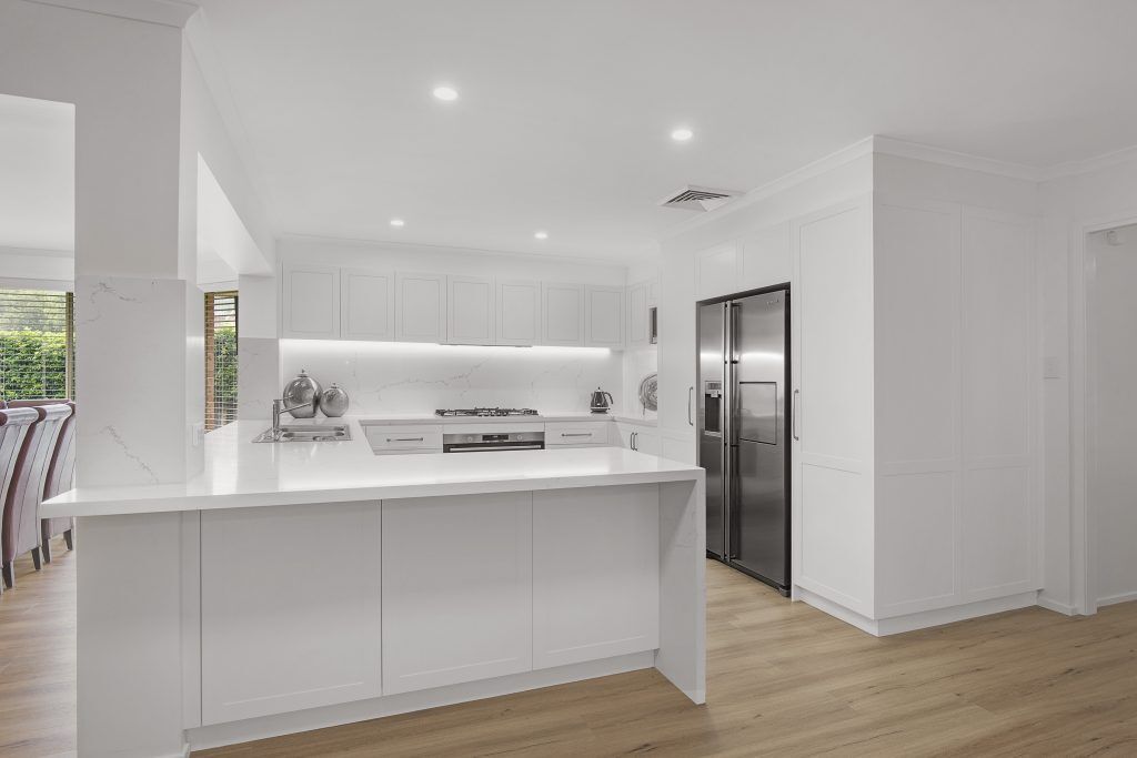 AFTER Castle Hill Renovation, Polyurethane Shaker style kitchen with stone benchtop and splashback