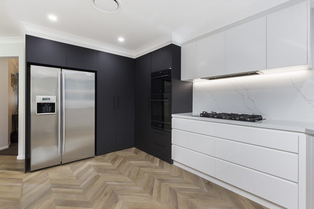 AFTER Holsworthy Renovation, Polyurethane Venette Kitchen with a Quantum Quartz Venatino Statuario breakfast bar, benchtops and splashback