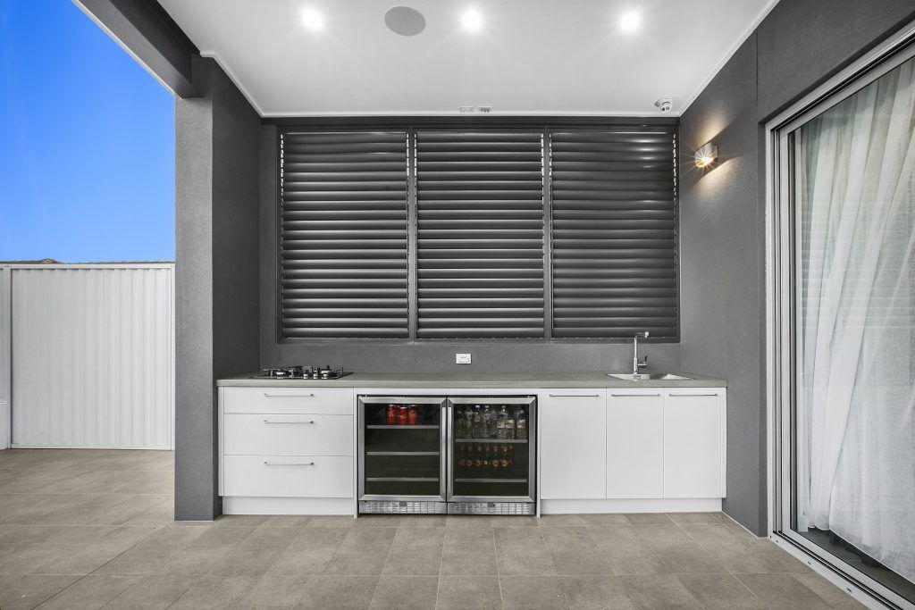 Waterproof Polyurethane outdoor kitchen with bar fridge - Chipping Norton, Sydney