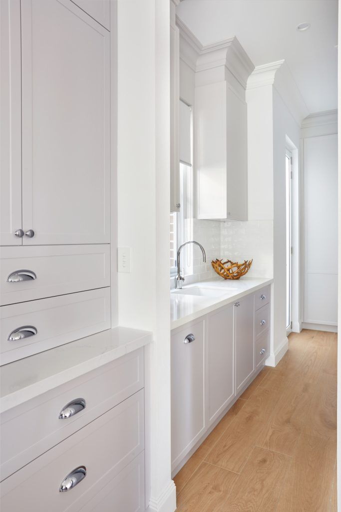 Belmore, Satin Polyurethane Shaker style kitchen with a stone benchtop and splashback