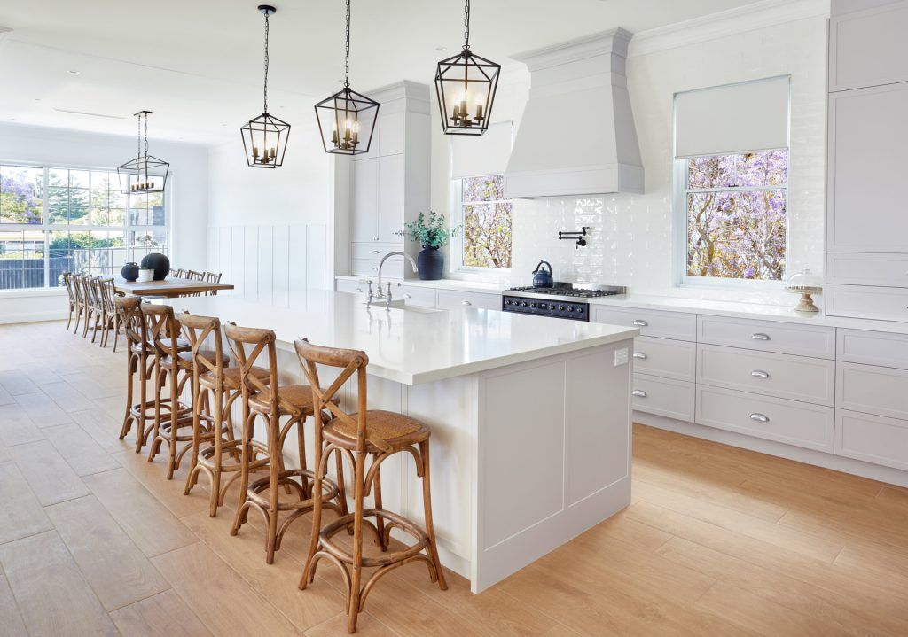 Belmore, Satin Polyurethane Shaker style kitchen with a stone benchtop and splashback