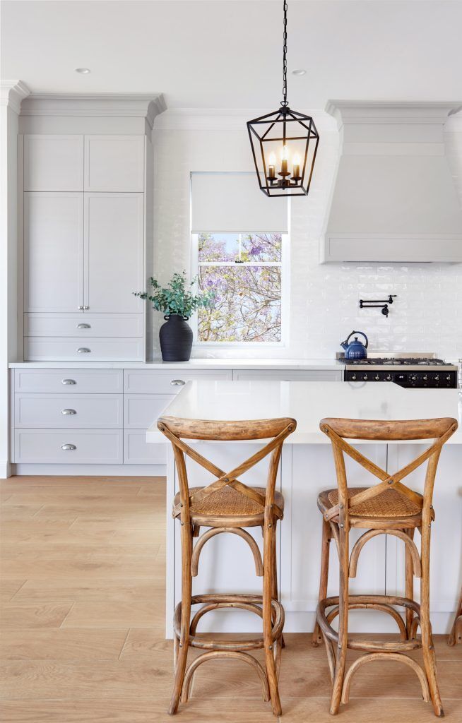 Belmore, Satin Polyurethane Shaker style kitchen with a stone benchtop and splashback